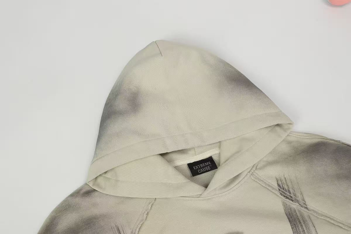 Distressed spray-paint washed hoodie