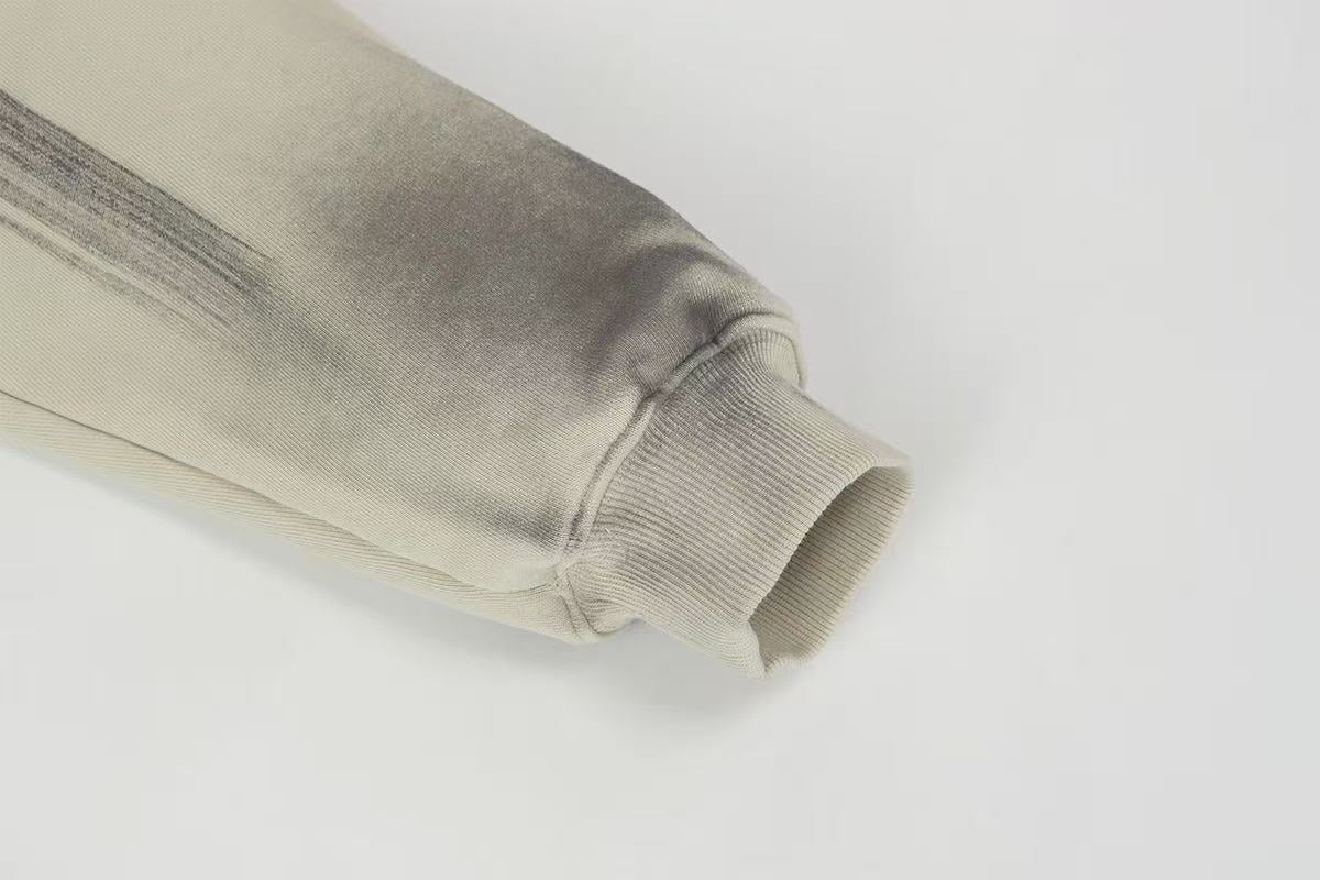 Distressed spray-paint washed hoodie