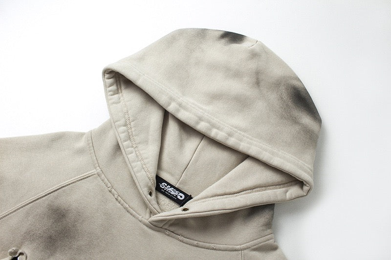 Distressed spray-paint washed hoodie