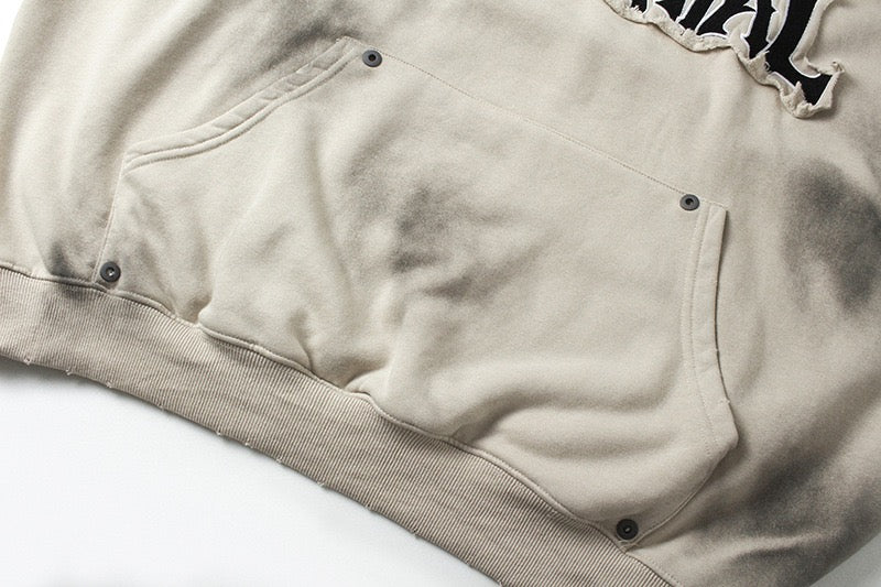 Distressed spray-paint washed hoodie