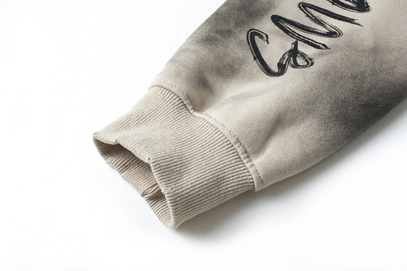 Distressed spray-paint washed hoodie